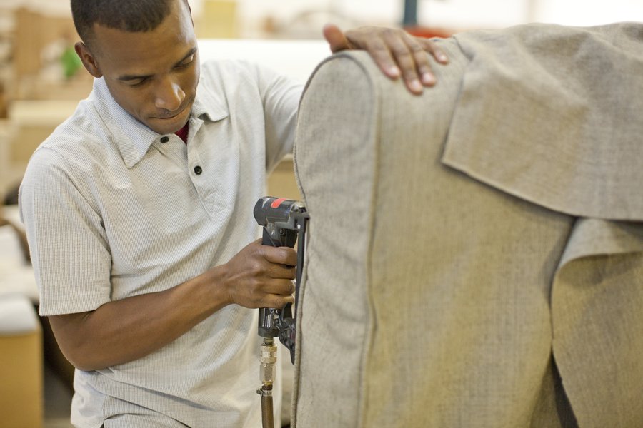 Professional upholstery repair on sofa in Lancashire